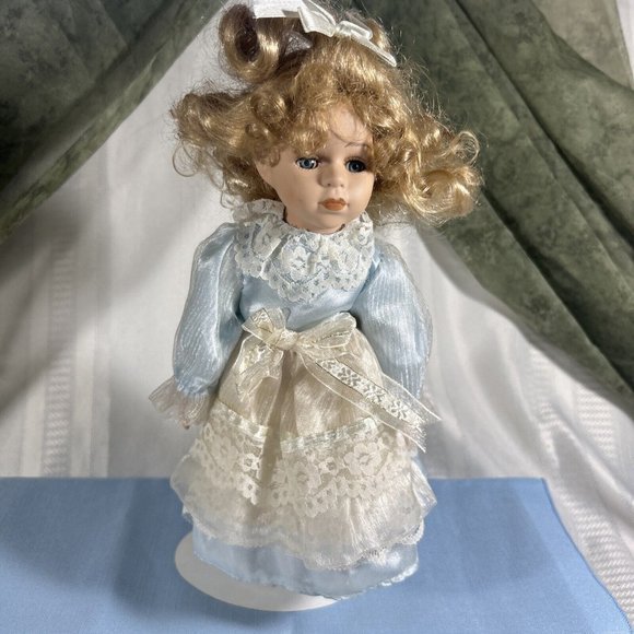 beautiful porcelain doll 12” Blue satin dress with layers of lace Curly hair - Picture 4 of 9